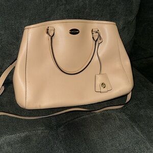 Lightly used tan Coach Purse
